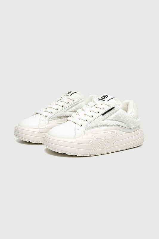 NYU Vulc Fleuri White — three-quarter product
