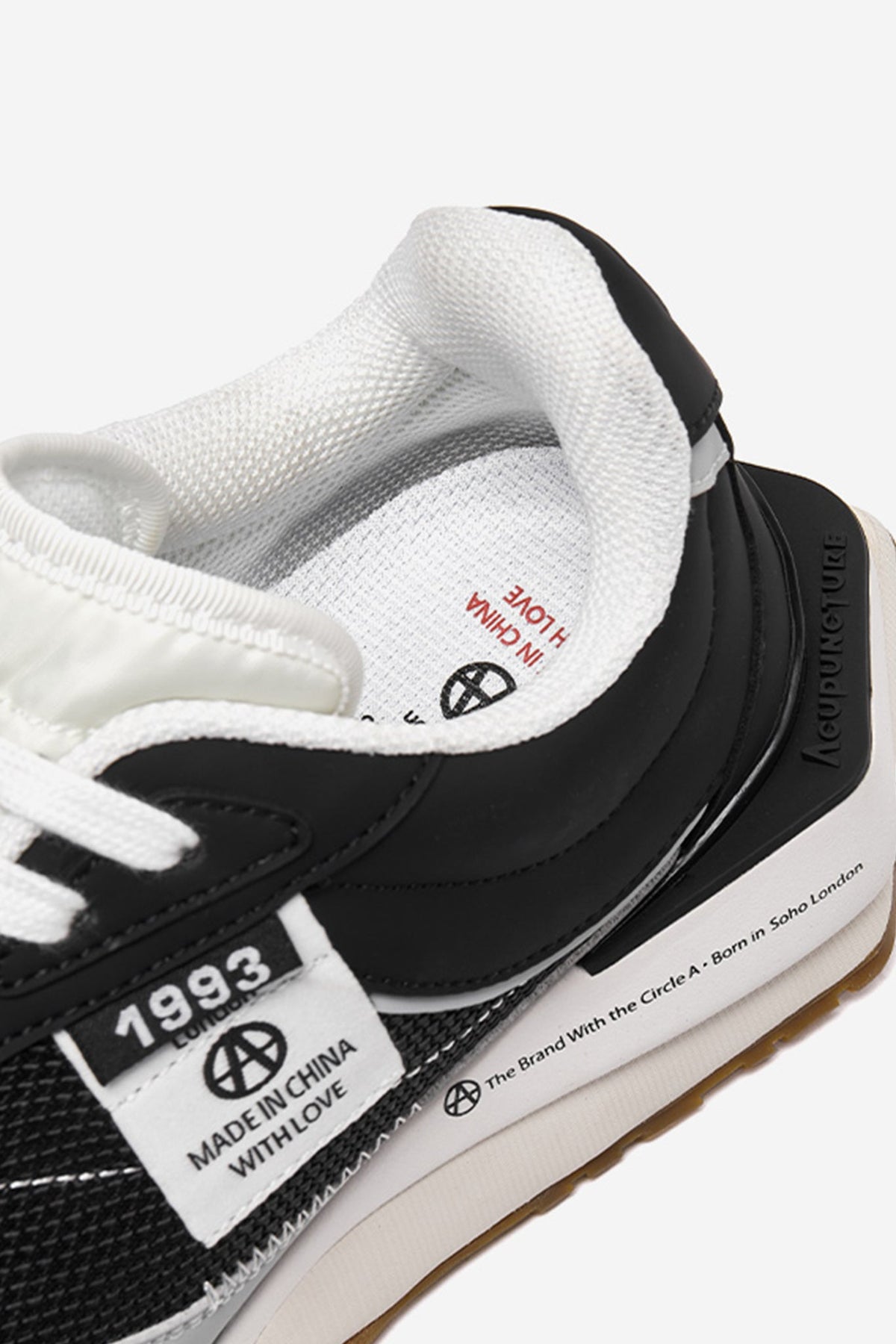 Delta Label Black — construction detail close-up