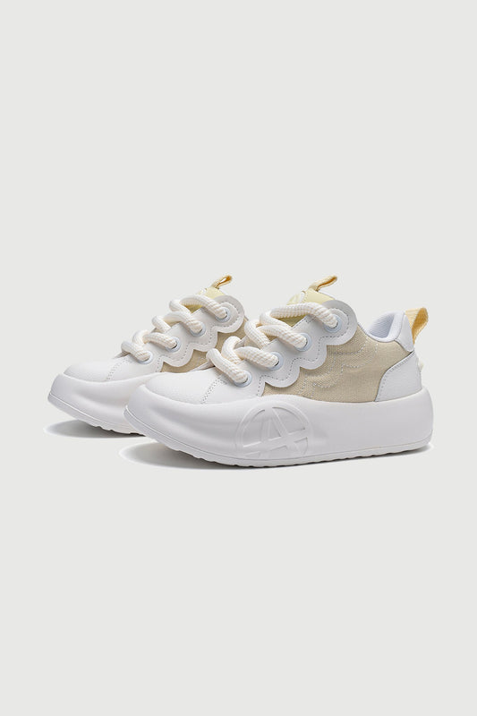 NYUE Undra Lemon Yellow — three-quarter product