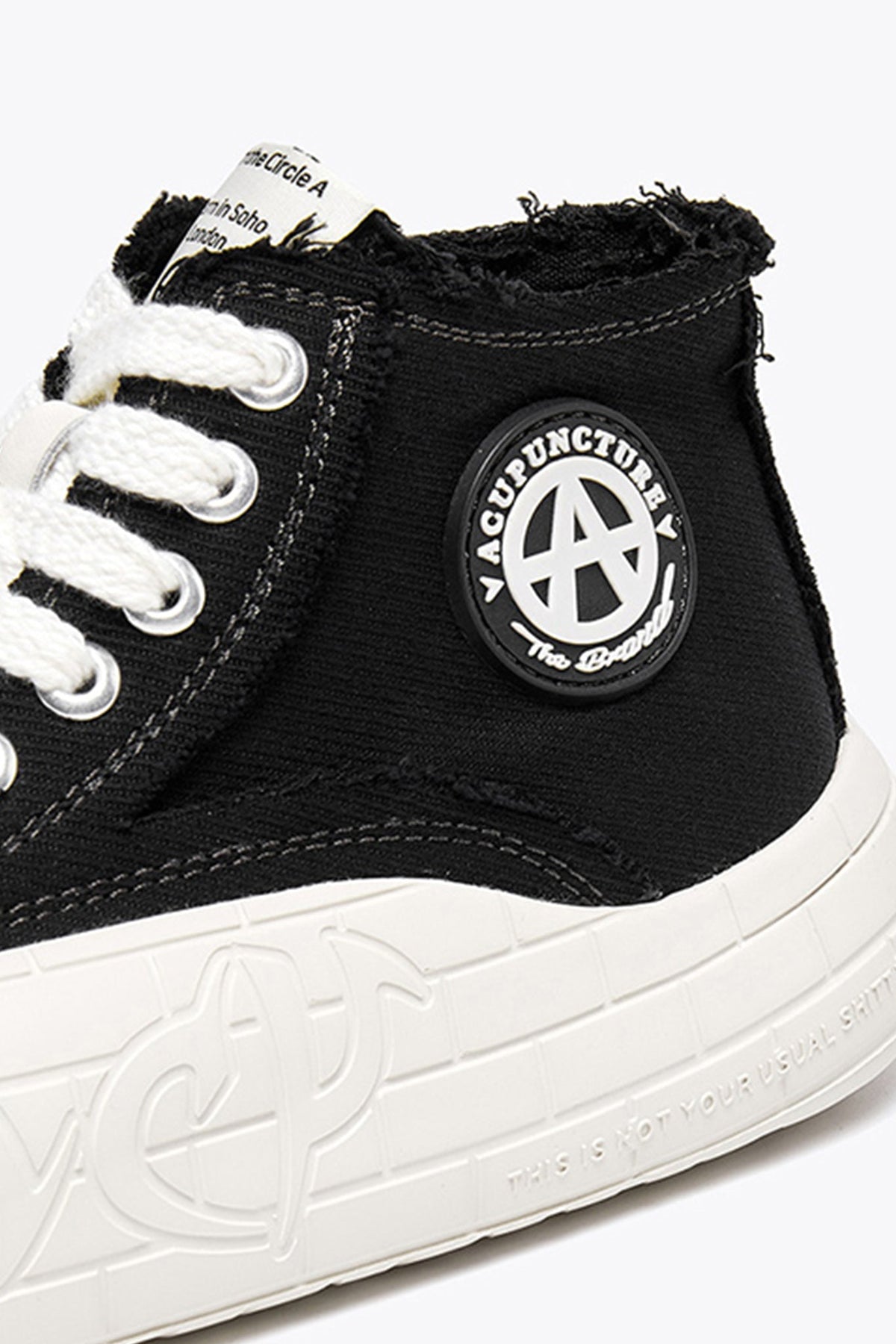 NYU Vulc Mid Black — construction detail close-up