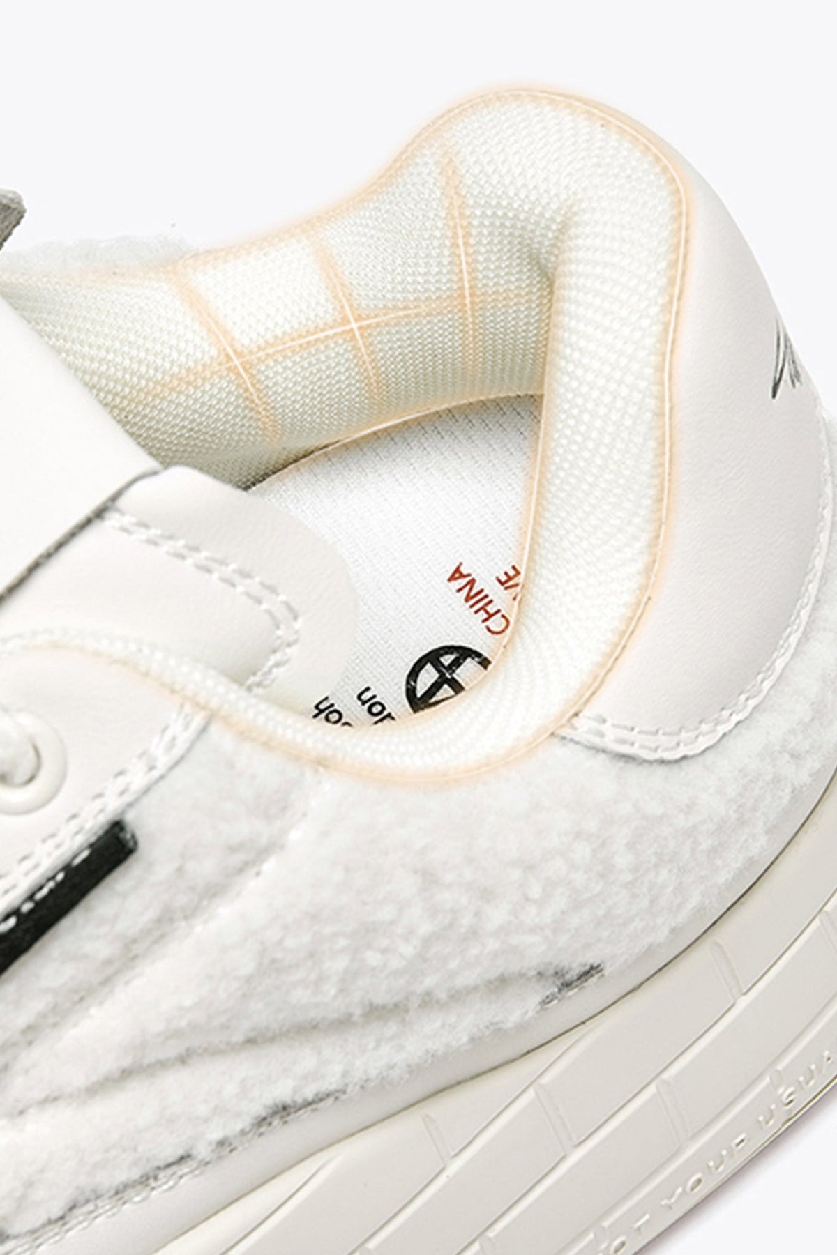 NYU Vulc Fleuri White — construction detail close-up